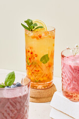 Refreshing Sea Buckthorn Ginger Lemonade with Vibrant Color Palette and Elegant Composition