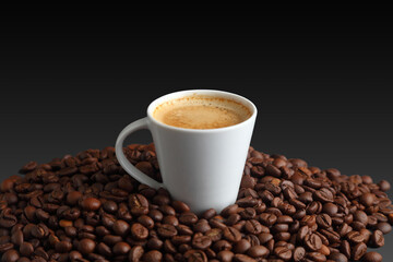 White Coffee Cup with Espresso Surrounded by Rich Dark Coffee Beans