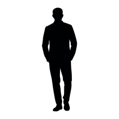 Silhouette of a businessman standing and hands in pockets