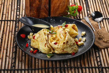 Sweet banana pancake with honey