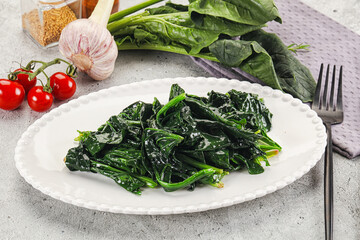 Coocked green spinach with oil