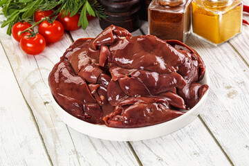 Raw chicken liver uncooked in the bowl