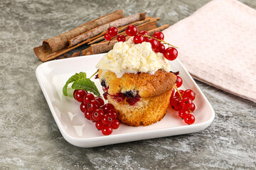 Delicous cupcake with red currant
