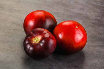 Black ripe juicy organic tomato