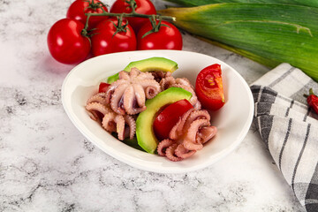 Salad with baby octopus and avocado