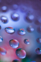 Soft focus and vintage lens. Aesthetic harmony blue background with real drops for advertisement and presentation, with copy space	