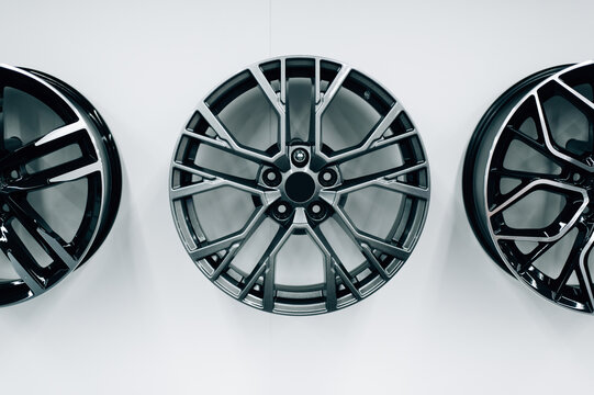 Car wheel rims hanging on the wall