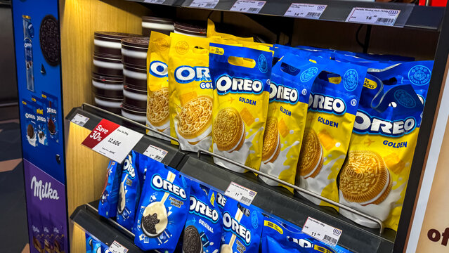 Assorted Oreo cookie packs on a store shelf, snack variety, indulgence, modern retail display, food choices March 10 2025, Belgrade, Serbia