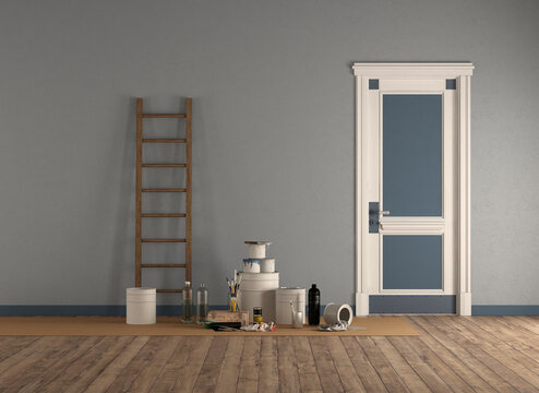 Room with  closed door after painting with paint cans, brushes and ladder