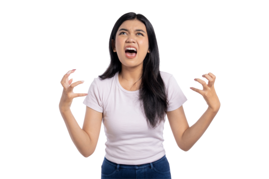 Angry young Asian woman expressing frustration and rage, yelling with hands raised, isolated on transparent background