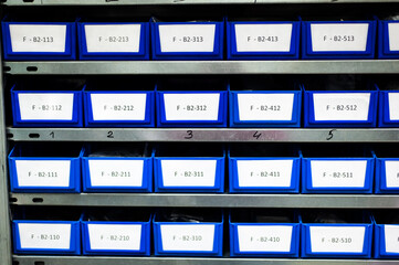 Storage bins for parts in the warehouse