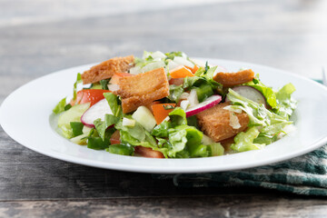 Fattoush salad, Traditional Lebanese Salad on wooden table