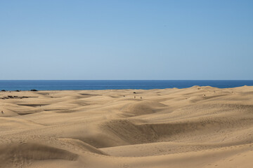 Sand dunes and Atlantic ocean, Gran Canaria, Spain