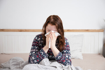 Sick child at home in bed. Acute respiratory viral infection.