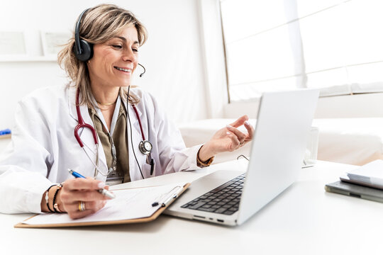 Doctor conducting a telemedicine consultation in an office
