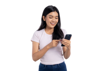 Happy young Asian woman smiling while using smartphone, pointing at screen, isolated on transparent background