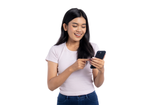 Happy young Asian woman smiling while using smartphone, pointing at screen, isolated on transparent background