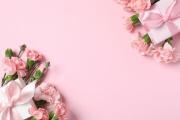 Beautiful bouquet of pink carnations on a colored background