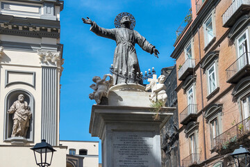 bronze statue to Saint Gaetano da Thiene" (about 1747) with "Angels" by Andrea Falcone nearby San Paolo Maggiore Church in Naples, Campania, Italy