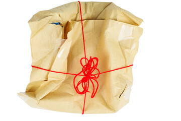 Damaged cardboard box with gift a isolated on white