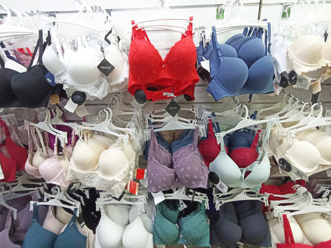 Colorful assortment of women's bras on display in retail store