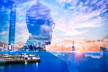 A double exposure blends a person gazing out with Hong Kong's vibrant cityscape and harbor under a bright sky, merging urban reflection and aspiration.