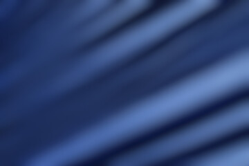 Abstract blurred background, dark blue, denim, berry tones. Dark and light, wavy, smooth, softness.