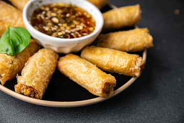 Nem rolls  sauce vietnamese rice paper roll gourmet food background on the table rustic food top view copy space