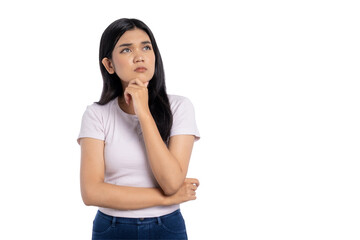 Thoughtful young Asian woman looking up with hand on chin, contemplating idea or making decision, isolated on transparent background