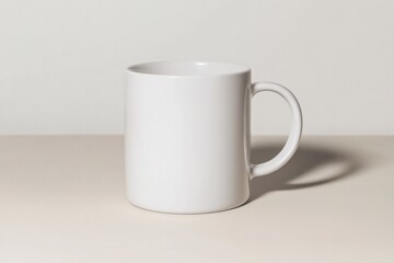 Fototapeta premium Minimalist design showcases plain white mug on smooth surface, p