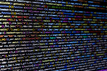 Software source code. Programming code. Programming code on computer screen. Developer working on...