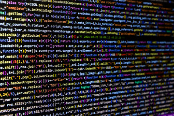 Software source code. Programming code. Programming code on computer screen. Developer working on...