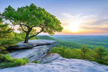A beautiful sunset view from Mohonk Mountain, with warm light casting over the valley below