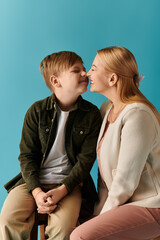 Joyful mother and son share a sweet moment in a bright modern setting filled with love