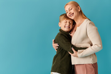 Joyful moments of bonding between modern mother and son captured in vibrant setting