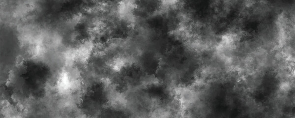 Fototapeta premium Worn and faded grunge-style black and gray watercolor wash with subtle cloudy details