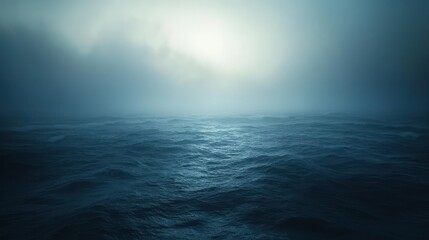 Obraz premium moody maritime scene where heavy mist envelopsocean, only faint traces of waves breakingstillness,diffused light creating ethereal and mysterious quality,