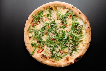 Deliciously Fresh Arugula Pizza with Peppers and Cheese