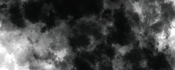 Weathered ink-splattered abstract background with black and gray grunge tones

