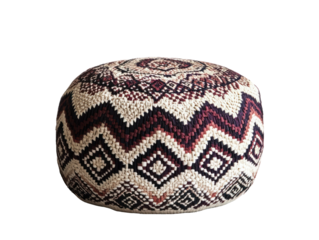 The image features a decorative, patterned pouf with an intricate geometric design against a transparent backdrop.