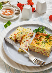 Baked Denver Omelette on a plate with fork