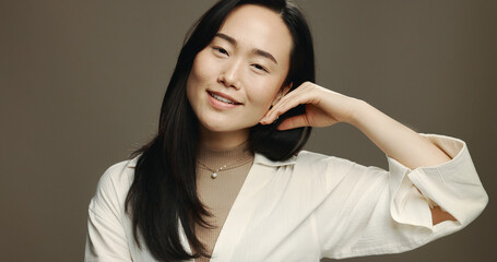 Skincare, smile and portrait of Asian woman in studio with beauty, natural and facial routine....
