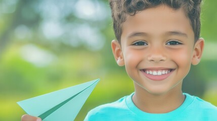 A Smiling Child Holding A Paper Airplane, Playing During Recess.