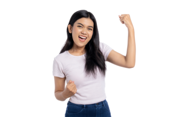 Excited young Asian woman celebrating victory with raised arms, showing success or achievement, isolated on transparent background