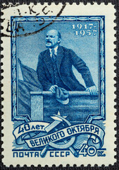 RUSSIA - CIRCA 1957: A postage stamp printed in the USSR depicts Vladimir Lenin Ulyanov on the podium, 40th anniversary of the Great October Revolution, Lenin Series, circa 1957.