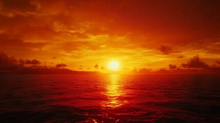 Spectacular Ocean Sunset with Fiery Skies and Golden Reflections