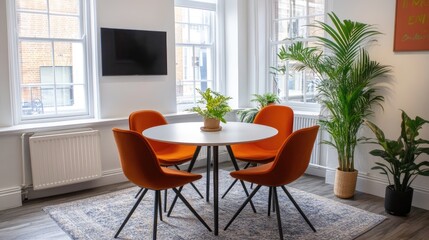 Fototapeta premium Small, cozy meeting room with a round table, stylish chairs, and minimalistic decor for brainstorming sessions.