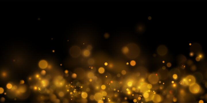 Abstract gold bokeh background with blurred lights.	