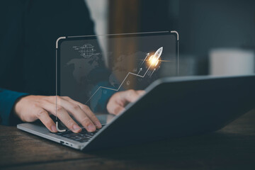businessman launch rocket, startup concept. entrepreneurship starts with digital technology and the...