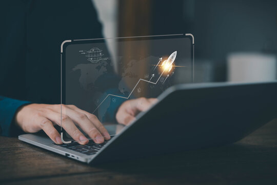 businessman launch rocket, startup concept. entrepreneurship starts with digital technology and the growth of an online business. progress of Leadership and new business success